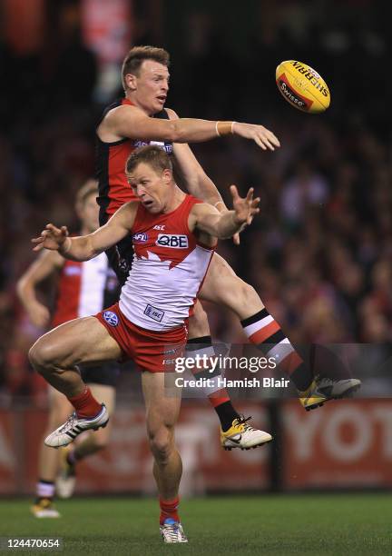 Brendon Goddard of the Saints gives away a free kick to Ryan O'Keefe of the Swans during the AFL Second Elimination Final match between the St Kilda...