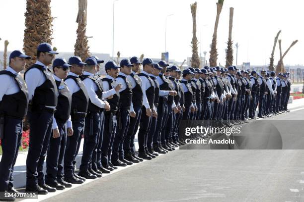 Police officers are seen in front of the International Convention Center as the UN climate summit COP27 is being held in Sharm el-Sheikh, Egypt on...