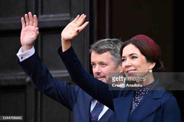 Crown Prince Frederik and Crown Princess Mary wave to the audience as they arrive for a reception at City Hall during the celebrations of the 50th...