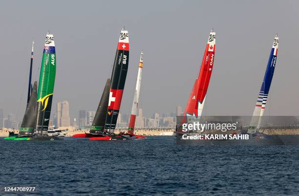 Sailors take part in the first day of the SailGP Grand Prix Dubai competition, in the Gulf emirate, on November 12, 2022.