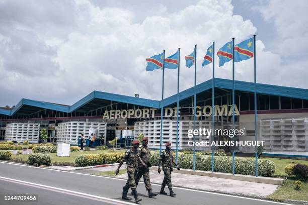 Soldiers of the Congolese Republican Guard walk on the tarmac of the airport in Goma, eastern Democratic Republic of Congo on November 12, 2022. -...