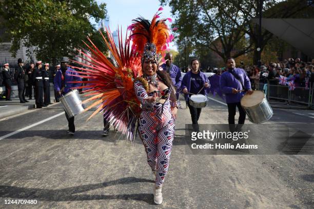 People participate in Lord Mayors Show parade on November 12, 2022 in London, England. The procession, which honours the new Lord Mayor of the City...