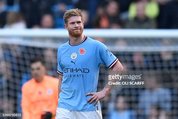 Manchester City's Belgian midfielder Kevin De Bruyne reacts to conceding their second goal during the English Premier League football match between...