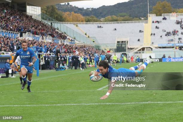 Ange Capuozzo of Italy scores a first half try during the Autumn International match between Italy and Australia on November 12, 2022 in Florence,...