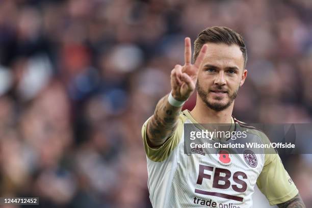 James Maddison of Leicester City holds up two fingers as he celebrates scoring the opening goal during the Premier League match between West Ham...