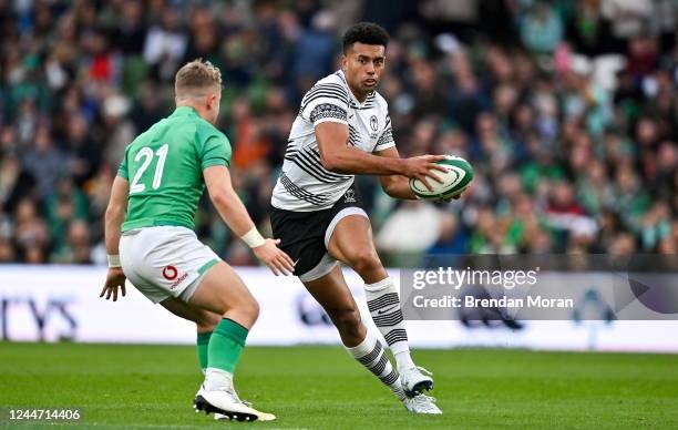 Dublin , Ireland - 12 November 2022; Ben Volavola of Fiji in action against Craig Casey of Ireland during the Bank of Ireland Nations Series match...