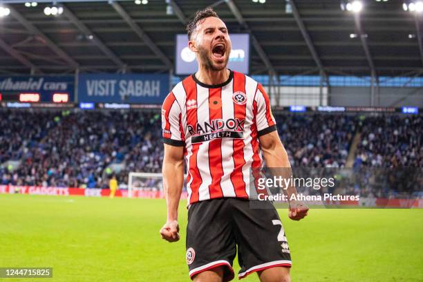 George Baldock of Sheffield United celebrates scoring during the Sky Bet Championship match between Cardiff City and Sheffield United at the Cardiff...