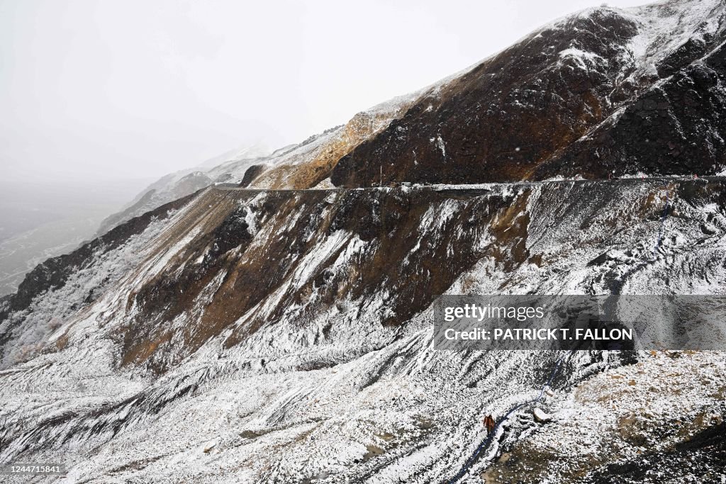 Pretty Rocks Denali A worker hikes thought the snow across the Pretty Rocks Landslide ...