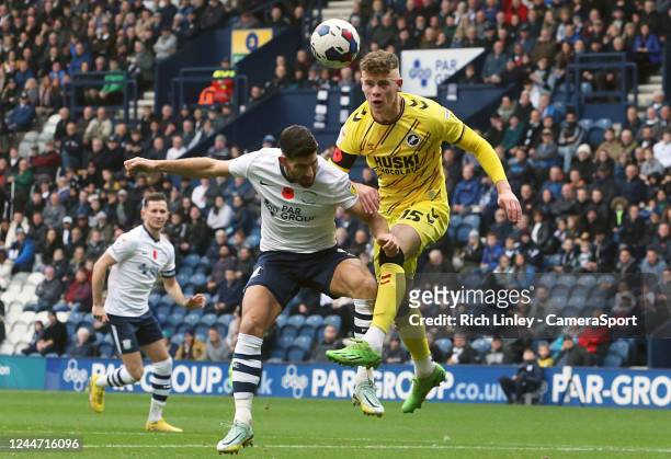 Preston North End's Ched Evans competes for an aerial ball with Millwall's Charlie Cresswell during the Sky Bet Championship between Preston North...