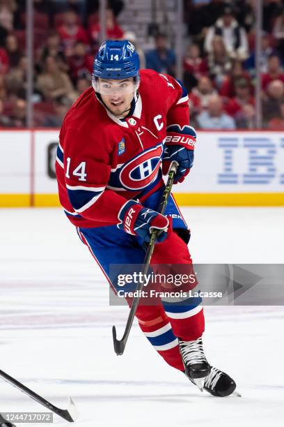 Jake Evans of Montreal Canadiens skates against the Vancouver Canucks during the first period in the NHL game at the Centre Bell on November 9, 2022...