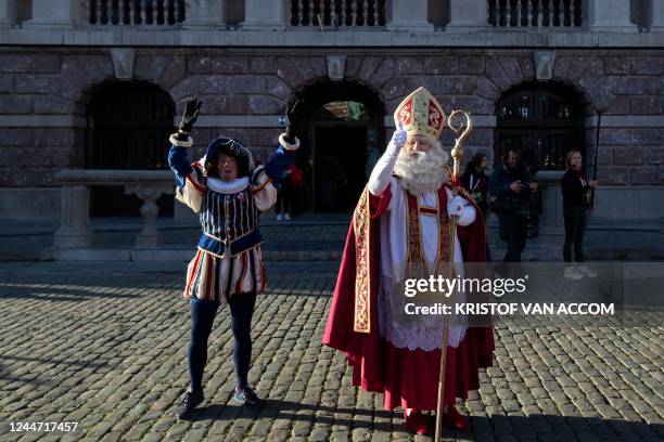 Zwarte Piet and Sinterklaas pictured during the arrival of Sinterklaas in Antwerp, Saturday 12 November 2022. Sinterklaas is a tradition, mostly...