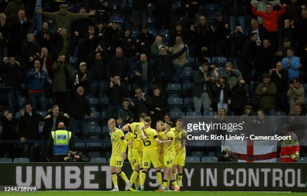 Millwall's Charlie Cresswell is mobbed by team-mates as he celebrates scoring his side's fourth goal during the Sky Bet Championship between Preston...