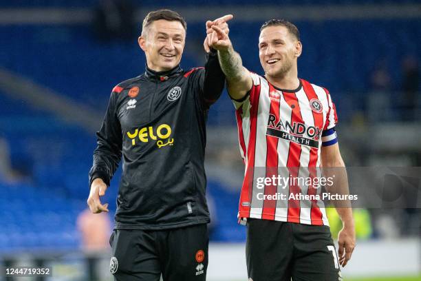 Paul Heckingbottom manager of Sheffield United and Billy Sharp of Sheffield United during the Sky Bet Championship match between Cardiff City and...