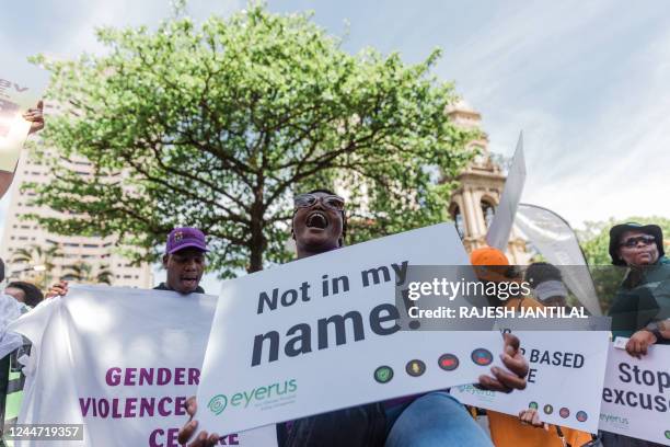 People march during the Mens Walk For Change where hundreds of men and women from the South African Police Services and gender based activists take...