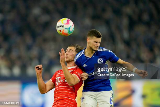 Leon Goretzka of Bayern Muenchen and Tom Krauss of FC Schalke 04 battle for the ball during the Bundesliga match between FC Schalke 04 and FC Bayern...