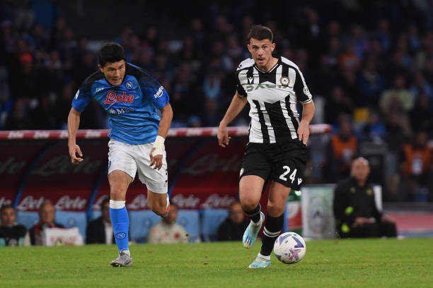 Lazar Samardzic of Udinese Calcio competes for the ball with Min-Jae Kim of SSC Napoli during the Serie A TIM match between SSC Napoli and Udinese...