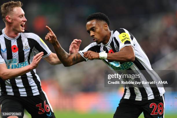 Joe Willock of Newcastle United celebrates after scoring a goal to make it 1-0 during the Premier League match between Newcastle United and Chelsea...