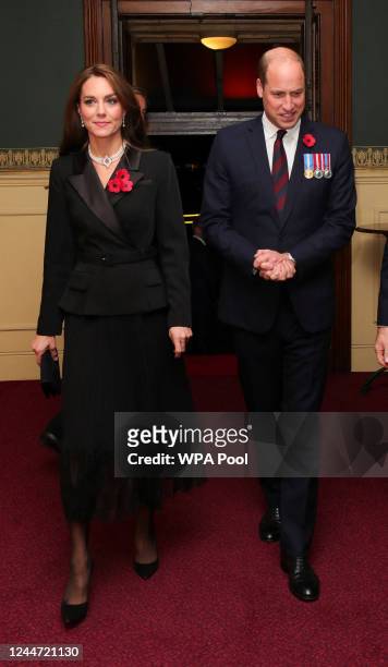 Britain's Prince William, Prince of Wales, and Catherine, Princess of Wales arrive to attend the Royal British Legion Festival of Remembrance at...
