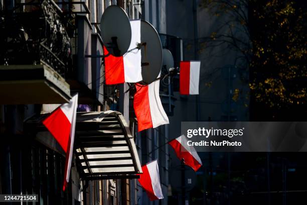 Polish flags are seen hanging on balconies on National Independence Day in Krakow, Poland on November 11, 2022.