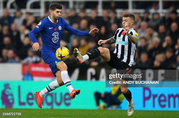 Chelsea's US midfielder Christian Pulisic vies with Newcastle United's English defender Kieran Trippier during the English Premier League football...