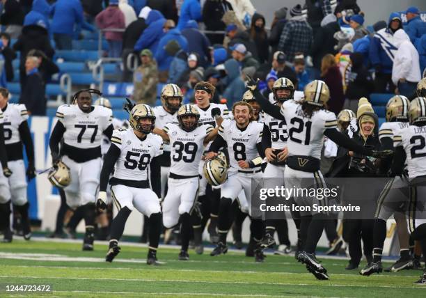 Vanderbilt Commodores players celebrate winning a game between the Vanderbilt Commodores and the Kentucky Wildcats on November 12 at Kroger Field in...