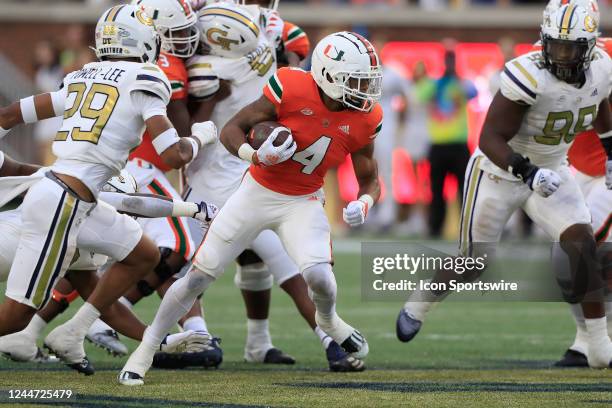 Miami Hurricanes running back Jaylan Knighton carries the football during the Saturday afternoon college football game between the Miami Hurricanes...