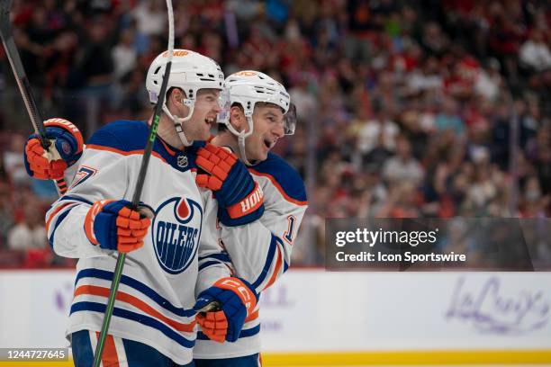 Warren Foegele of the Edmonton Oilers and Zach Hyman of the Edmonton Oilers celebrate a goal during the game between the Florida Panthers and the...