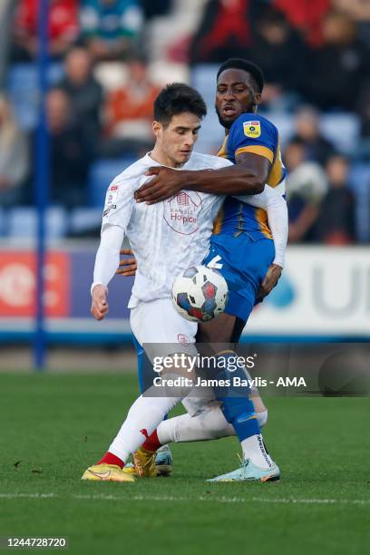 Chey Dunkley of Shrewsbury Town and Slobodan Tedic of Barnsley during the Sky Bet League One between Bristol Rovers and Fleetwood Town at Montgomery...