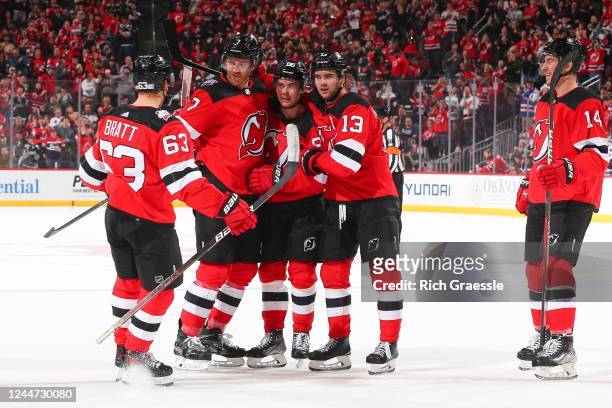 Dougie Hamilton of the New Jersey Devils celebrates his goal with teammates in the second period of the game against the Arizona Coyotes on November...