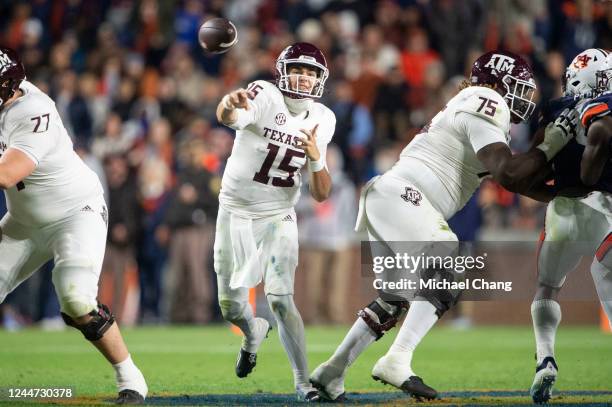 Quarterback Conner Weigman of the Texas A&M Aggies throws a pass during the first half of their game against the Auburn Tigers at Jordan-Hare Stadium...