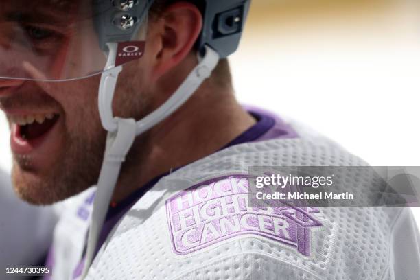 Hockey Fights Cancer patch is displayed on the jersey of Devon Toews of the Colorado Avalanche during warm-ups prior to the game against the Carolina...