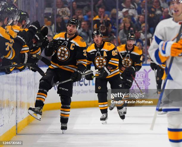 Patrice Bergeron of the Boston Bruins celebrates a power play goal during the second period against the Buffalo Sabres at KeyBank Center on November...