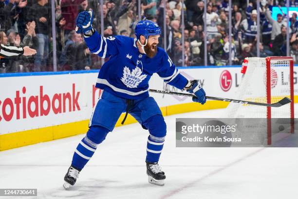 Jordie Benn of the Toronto Maple Leafs celebrates his goal against the Vancouver Canucks during the second period at the Scotiabank Arena on November...