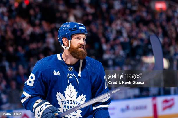 Jordie Benn of the Toronto Maple Leafs salutes the crowd after receiving a star of the game after defeating the Vancouver Canucks at the Scotiabank...