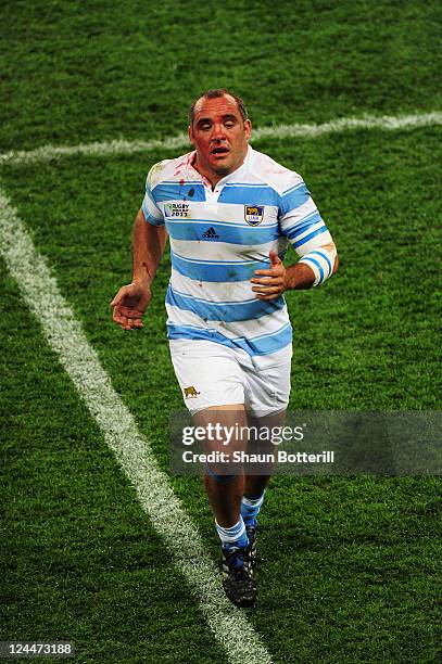 Rodrigo Roncero of Argentina leaves the pitch for medical attention during the IRB 2011 Rugby World Cup Pool B match between Argentina and England at...