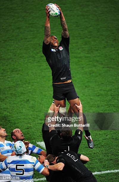 Courtney Lawes of England secures the lineout ball during the IRB 2011 Rugby World Cup Pool B match between Argentina and England at Otago Stadium on...
