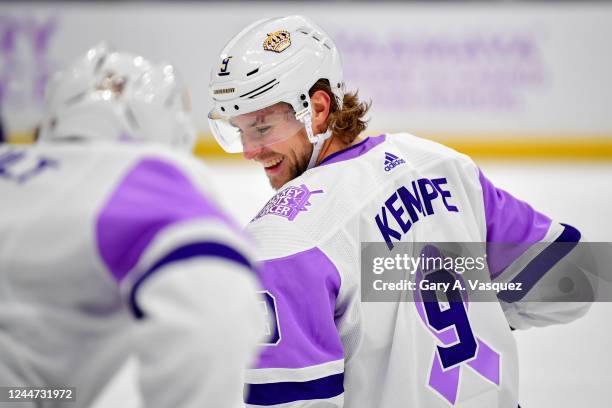 Adrian Kempe of the Los Angeles Kings smiles during warm ups on Hockey Fights Cancer Night prior to the game against the Detroit Red Wings at...