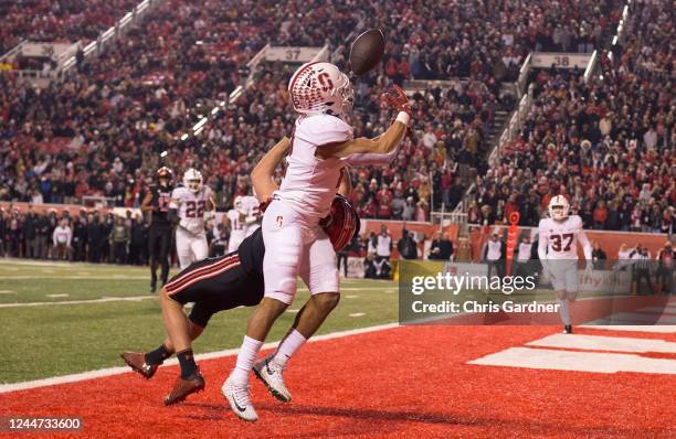 Jonathan McGill of the Stanford Cardinal intercepts a pass in the endzone intended for Dalton Kincaid of the Utah Utes during the first half of their...