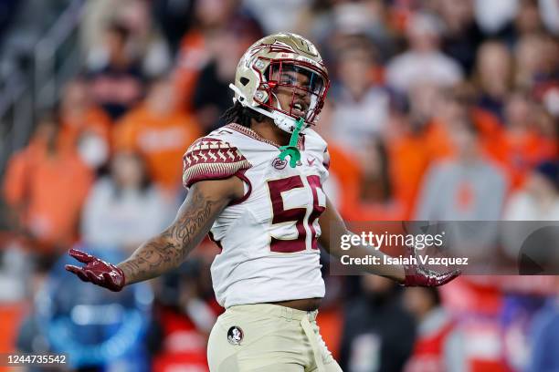 Patrick Payton of the Florida State Seminoles reacts after a sack against the Syracuse Orange during the game at JMA Wireless Dome on November 12,...