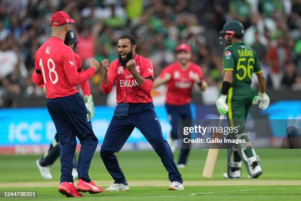 Adil Rashid of England celebrates the wicket of the Mohammad Haris of Pakistan during the ICC Men's T20 World Cup final match between Pakistan and...