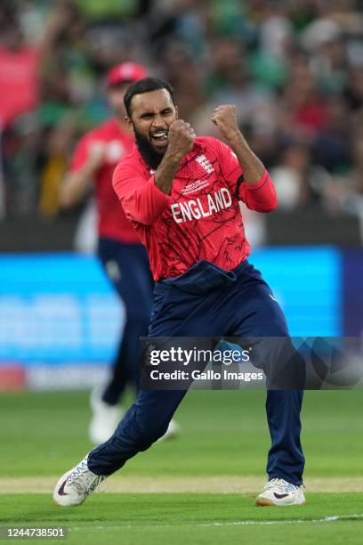 Adil Rashid of England celebrates the wicket of the Mohammad Haris of Pakistan during the ICC Men's T20 World Cup final match between Pakistan and...