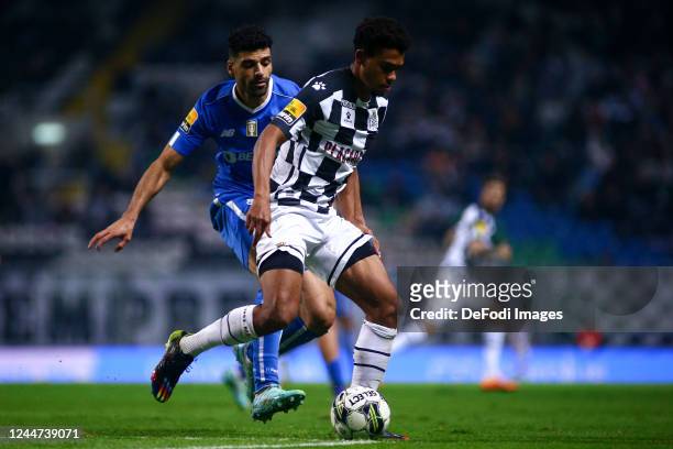 Mehdi Taremi of FC Porto and Reggie Cannon of Boavista FC battle for the ball during the Liga Portugal Bwin match between Boavista and FC Porto at...