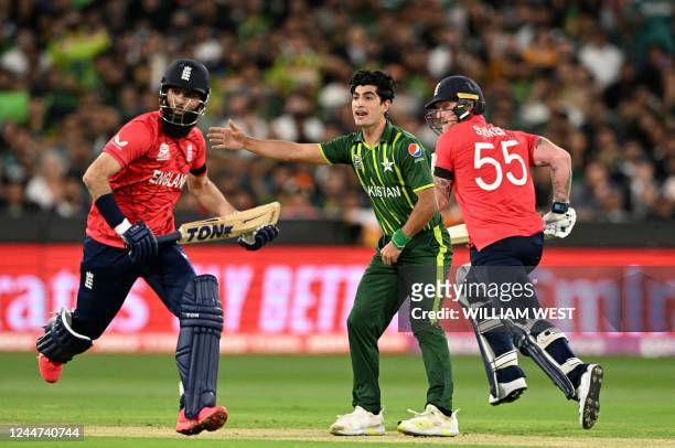 Pakistan's Naseem Shah gestures as England's Moeen Ali and England's Ben Stokes run between the wickets during the ICC men's Twenty20 World Cup 2022...