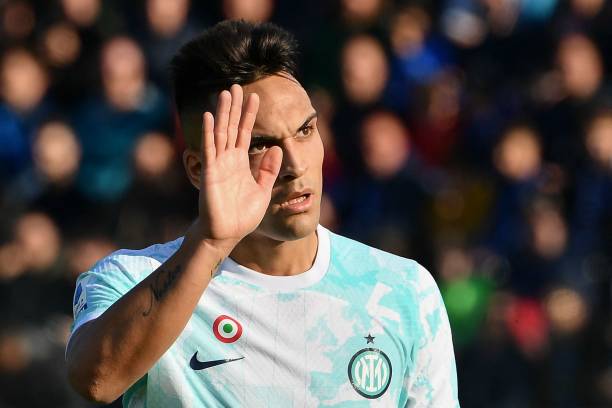 Inter Milan's Argentinian forward Lautaro Martinez waves as he leaves the pitch to be substituted during the Italian Serie A football match between...