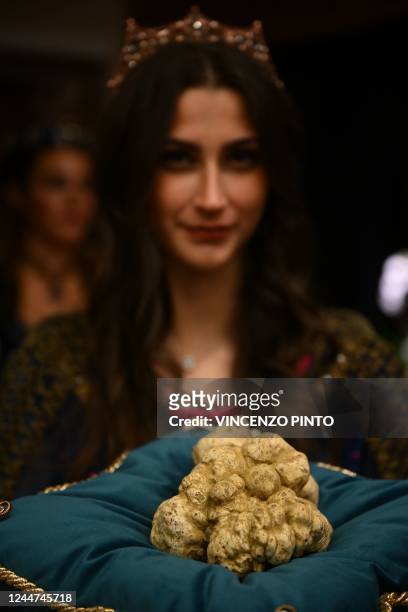 Grams Alba white truffle to be auctioned is displayed on November 13, 2022 at the Castle of Grinzane Cavour, northern Italy, during the 23rd Alba...