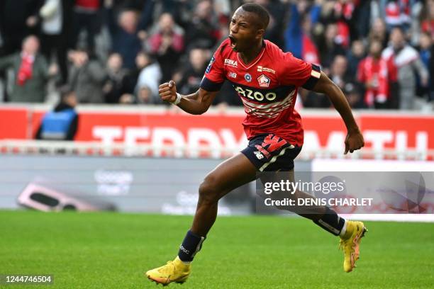 Lille's Portuguese defender Tiago Djalo celebrates scoring his team's first goal during the French L1 football match between LOSC Lille and Angers...