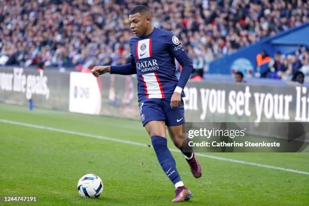 Kylian Mbappe of Paris Saint-Germain controls the ball during the Ligue 1 match between Paris Saint-Germain and AJ Auxerre at Parc des Princes on...