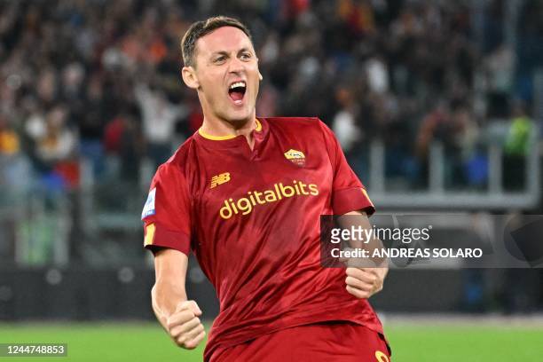 Roma's Serbian midfielder Nemanja Matic celebrates after scoring an equalizer during the Italian Serie A football match between AS Rome and Torino on...