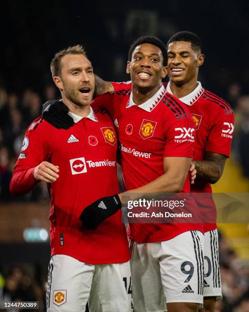 Christian Eriksen of Manchester United celebrates scoring a goal to make the score 0-1 with team-mates Anthony Martial and Marcus Rashford during the...