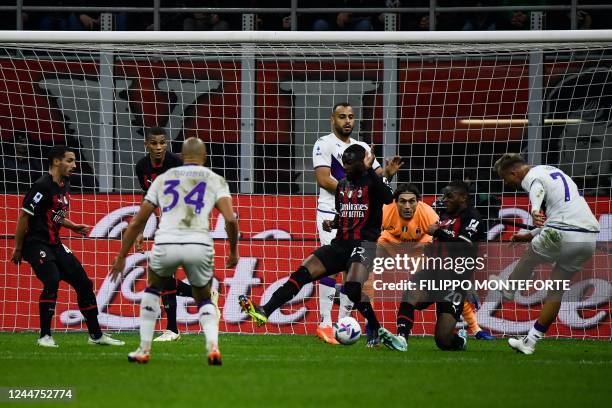 Fiorentina's Czech midfielder Antonin Barak scores an equalizer during the Italian Serie A football match between AC Milan and Fiorentina on November...